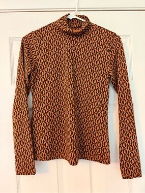 Maeve geometric print Turtleneck Top in Orange and Black